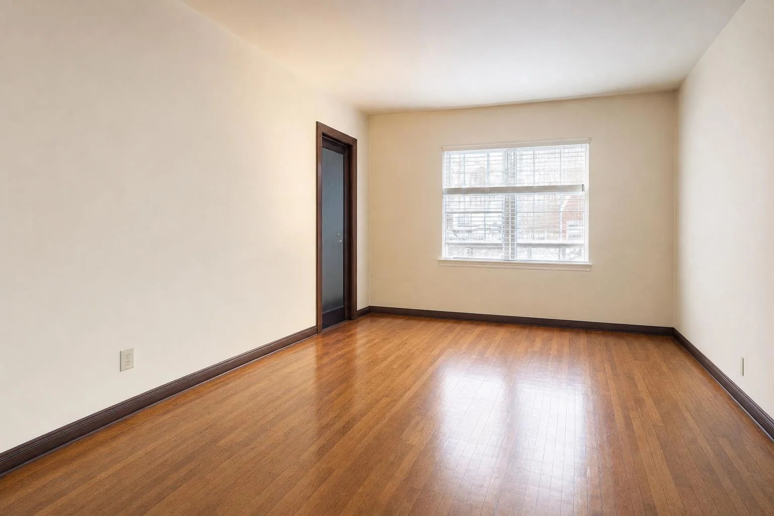 A cluttered room cleared to an empty, clean space ready to re-stage.