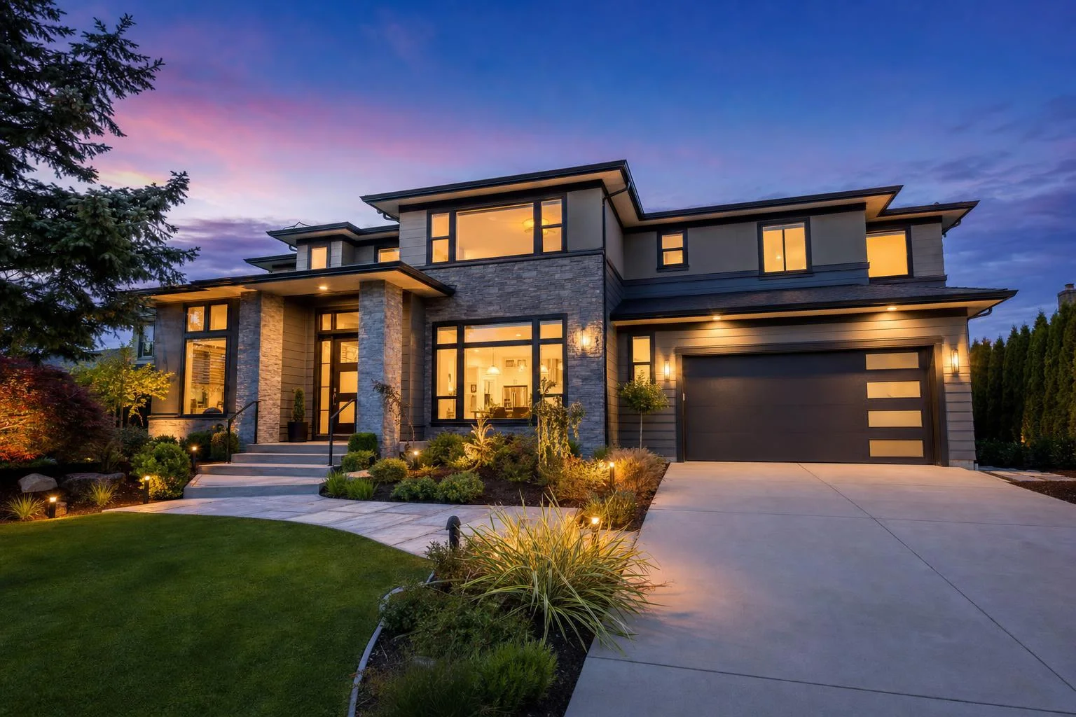 A suburban home exterior turned from daytime into warm twilight.